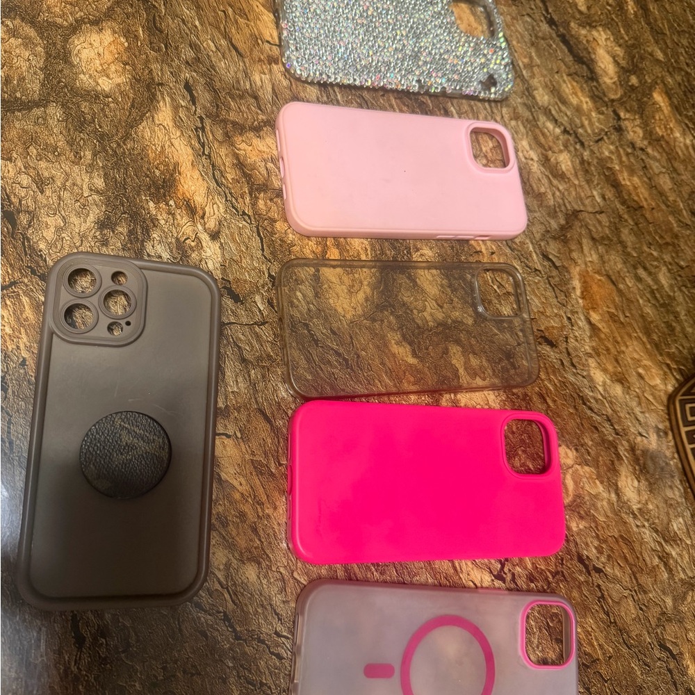 Apple iPhone Cases in Pink, Gray, and Clear